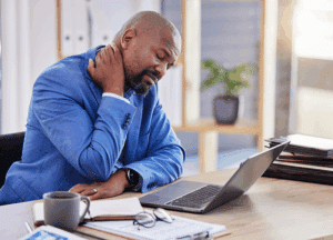 A man wincing with neck pain referencing Impact of Stress on Healing After an Injury